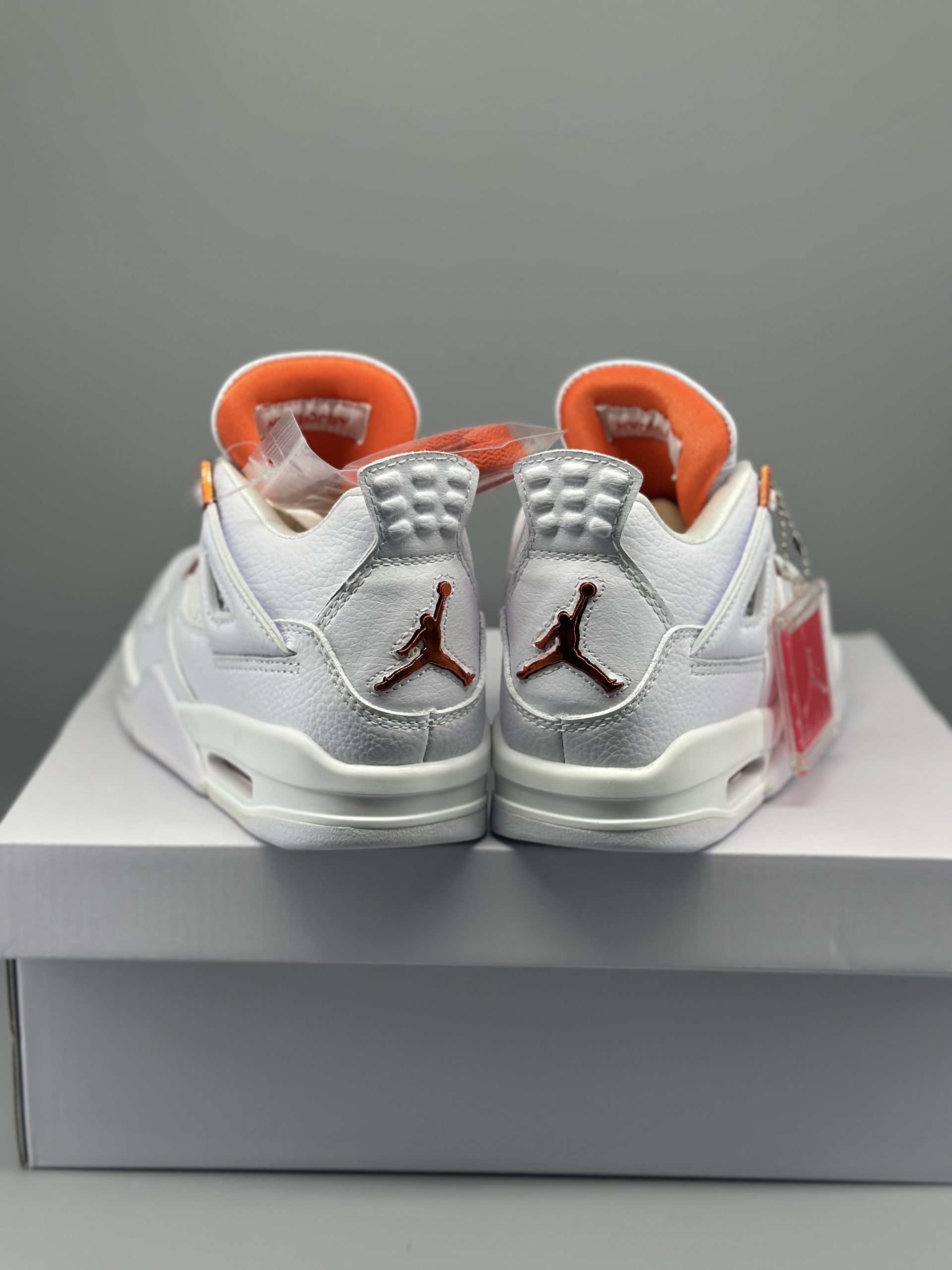 Jordan 4 Retro Metallic Orange