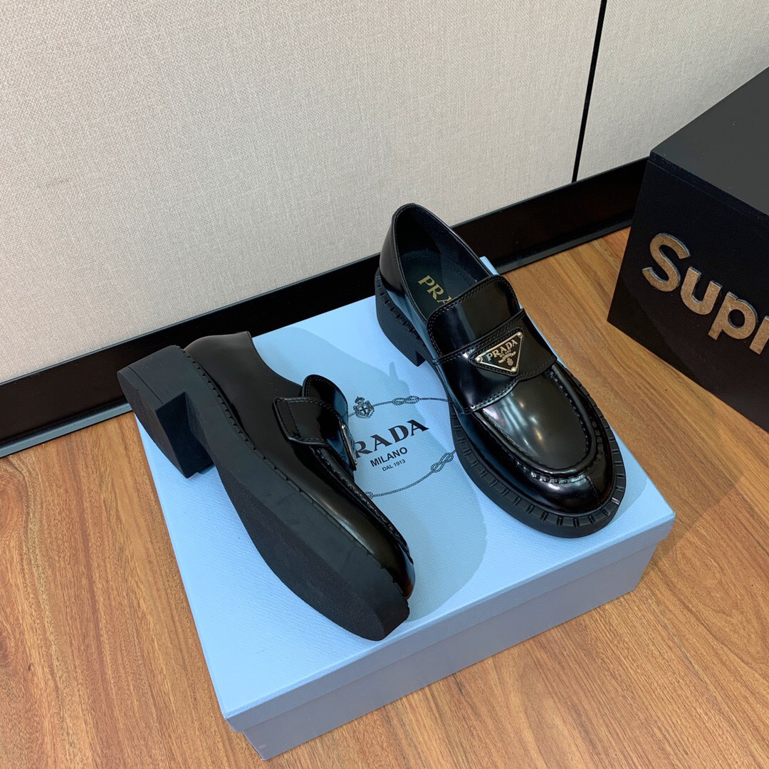 PRADA Women’s Black Brushed Leather Loafers