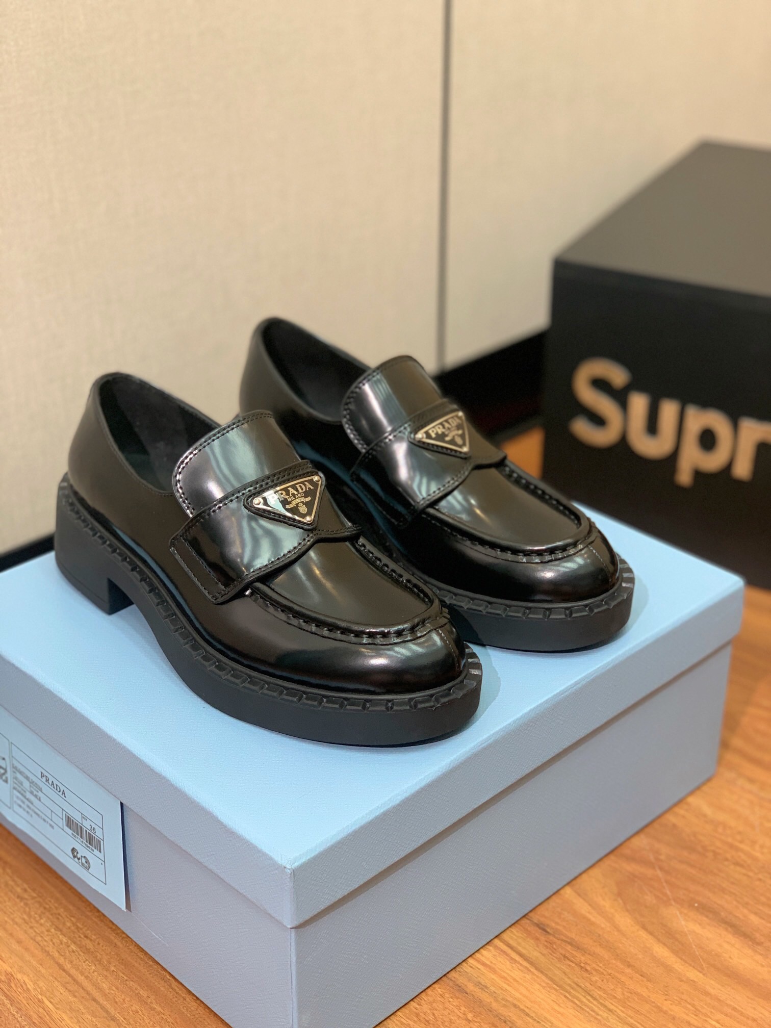 PRADA Women’s Black Brushed Leather Loafers